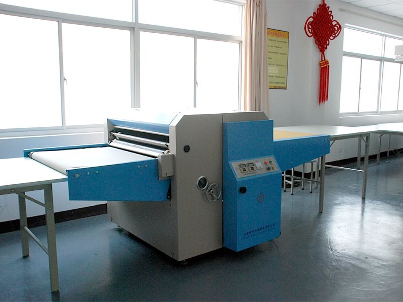 Adhesive lining machine